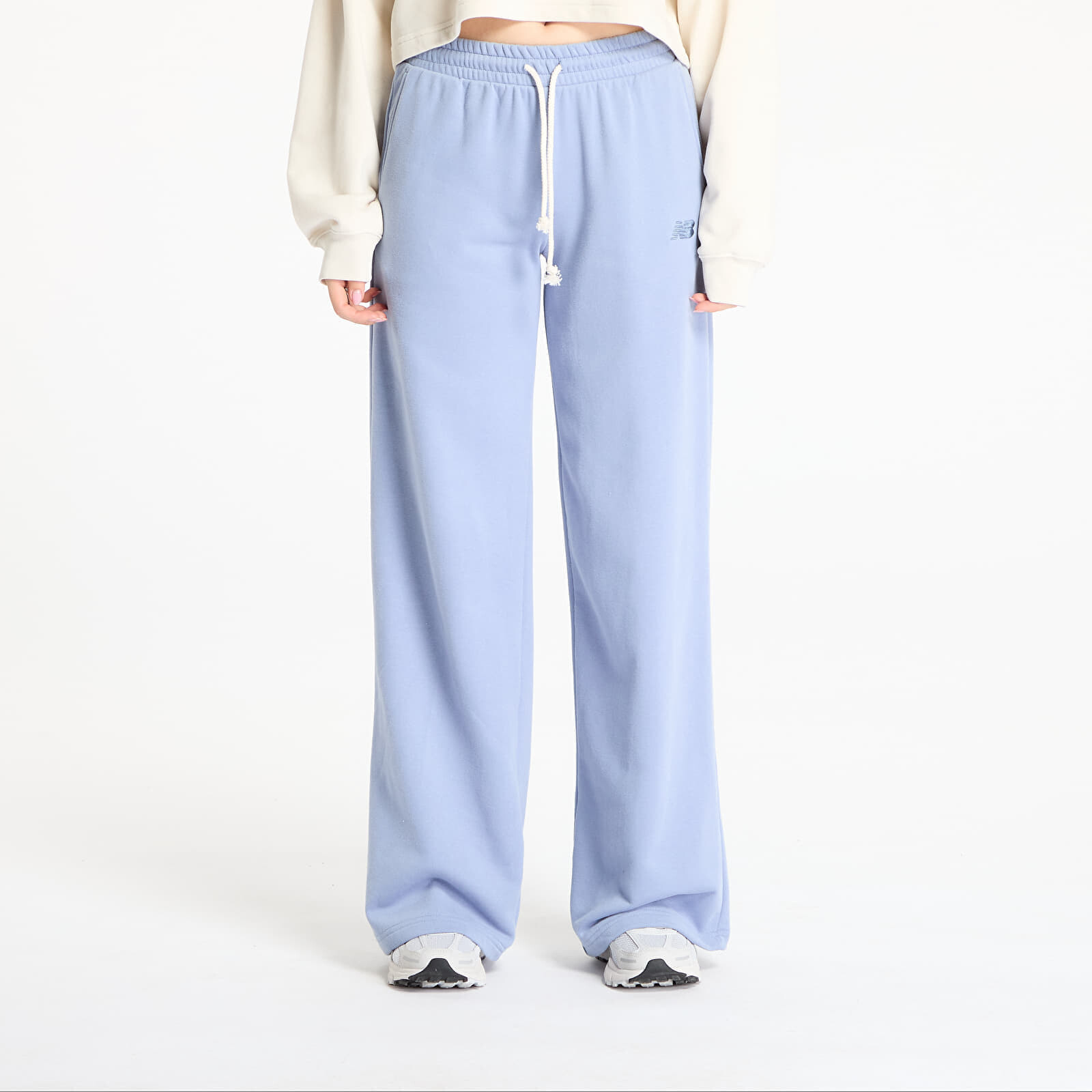 Tepláky New Balance Coastal Fleece Pant Dusk Shower L