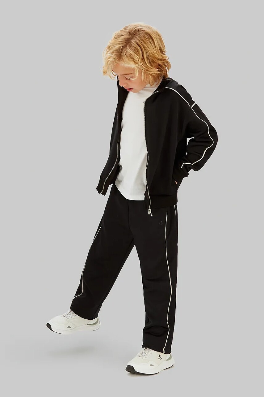 Detské tepláky Calvin Klein Jeans čierna farba, jednofarebné, IB0IB02606