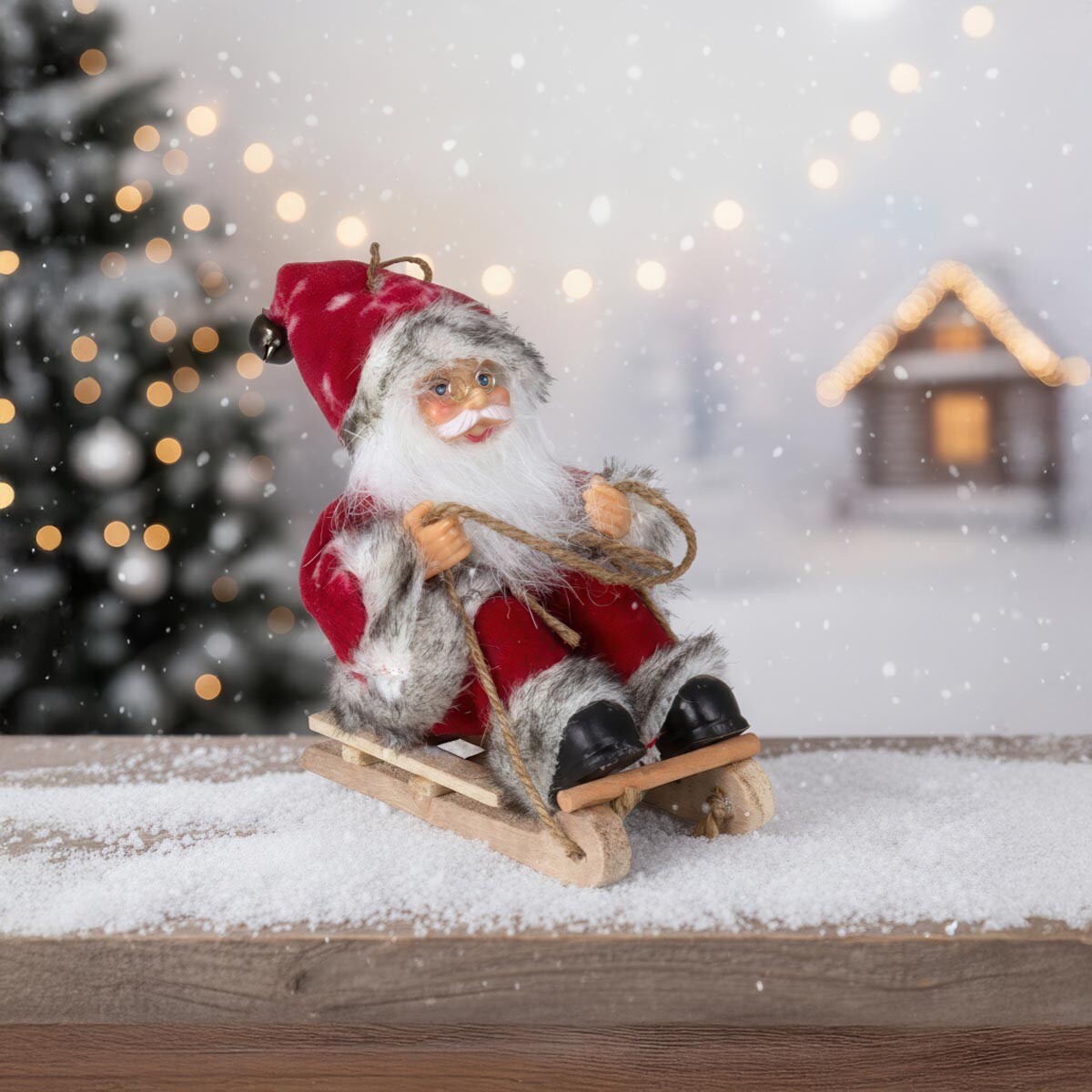 Vianočná ozdoba Santa na saniach