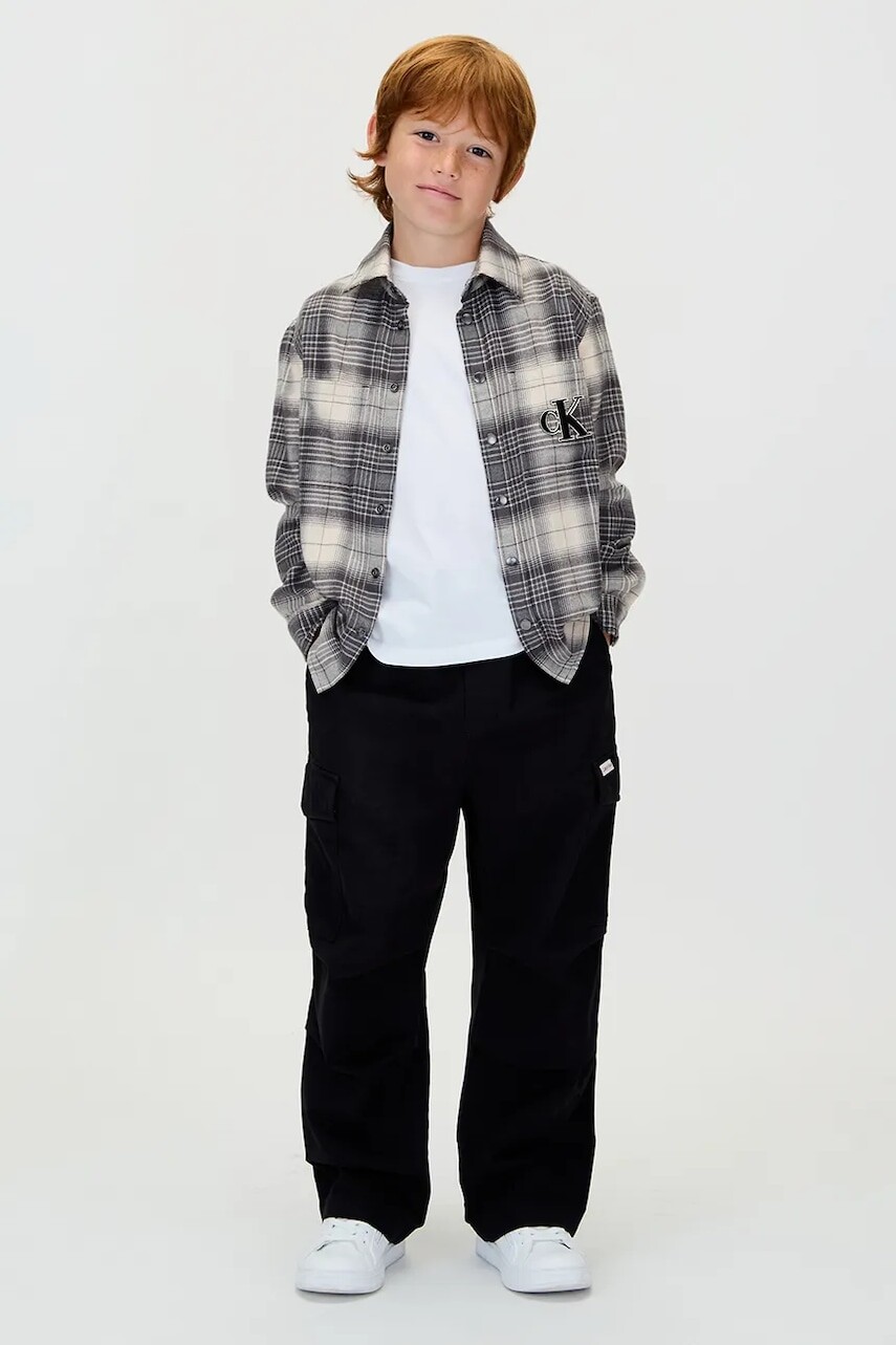 Nohavice Calvin Klein Jeans čierna farba, IB0IB02555