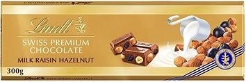 LINDT Gold Tablet Švajčiarska Mliečna Čokoláda S Hrozienkami A Orieškami 300 g