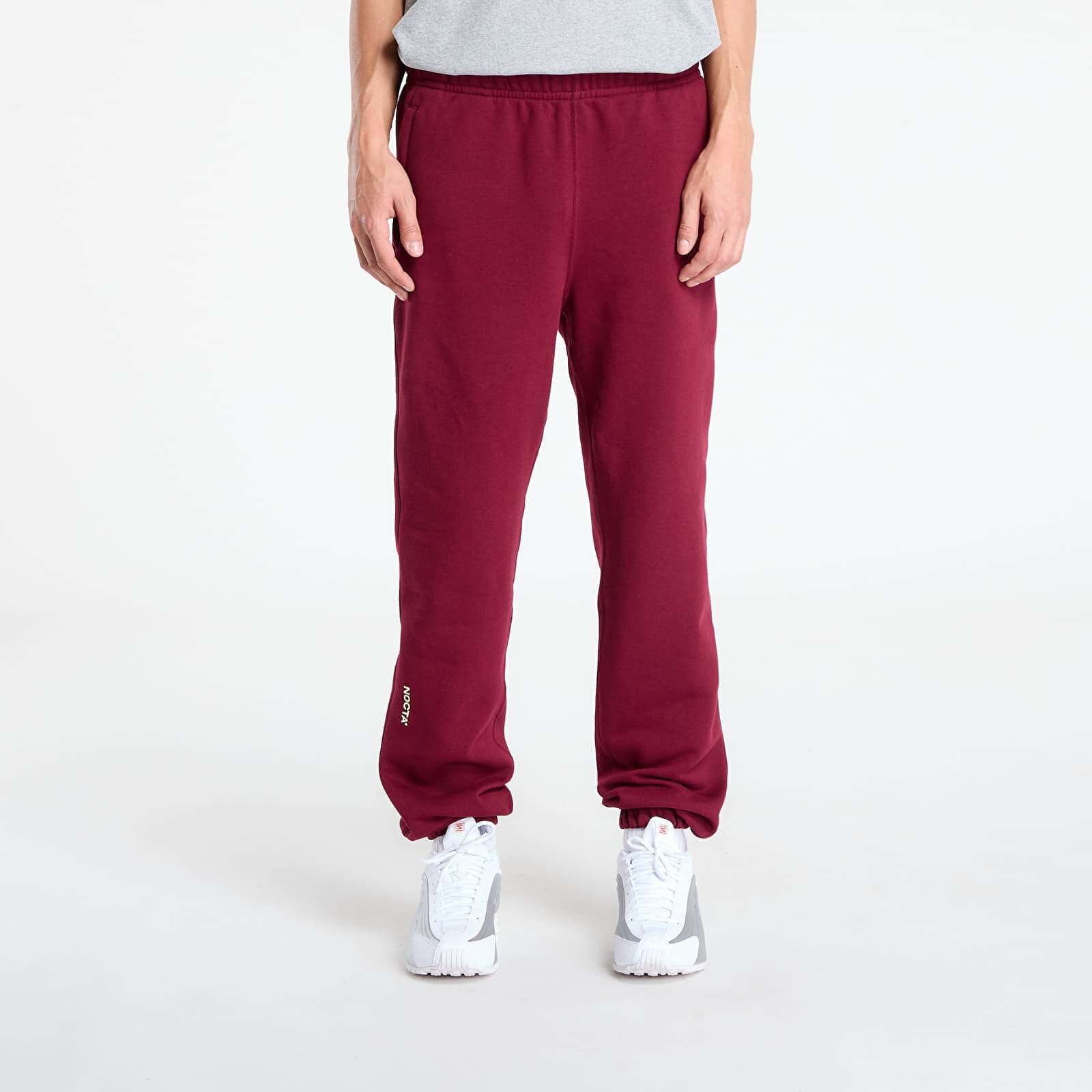 Tepláky Nike x NOCTA Fleece CS Sweatpants Dark Beetroot/ Citron Tint XL