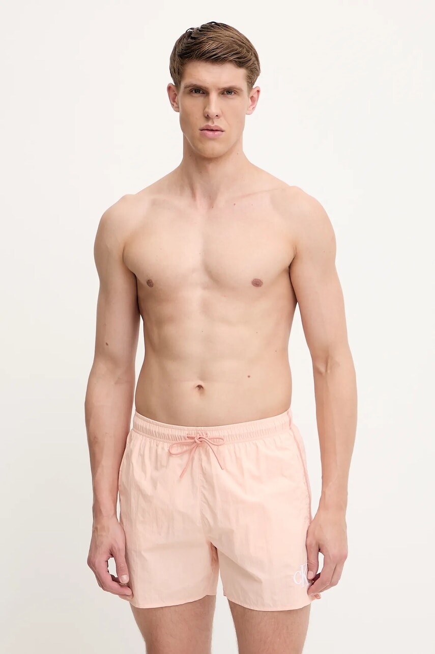 Plavkové šortky Calvin Klein oranžová farba, KM0KM01102