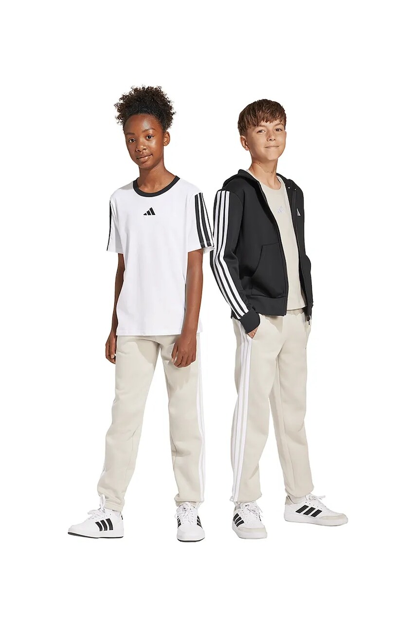 Detské tepláky adidas béžová farba, s nášivkou, KB7309