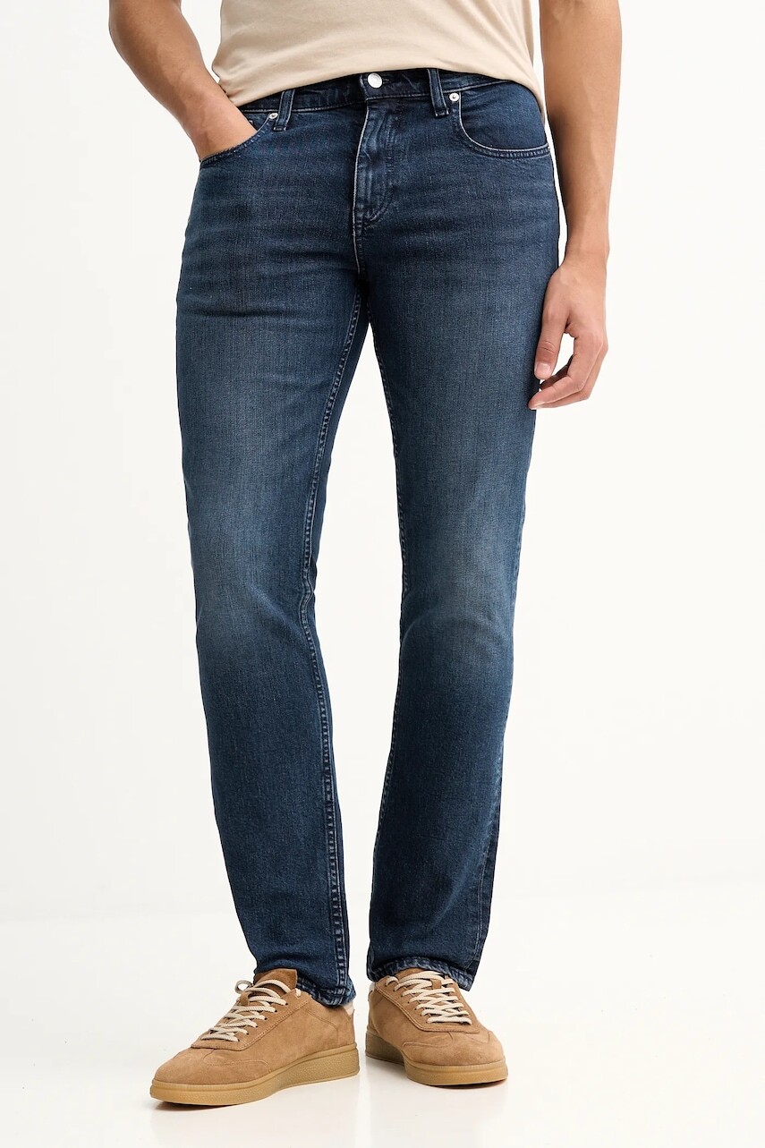 Rifle Tommy Jeans tmavomodrá farba, DM0DM22587