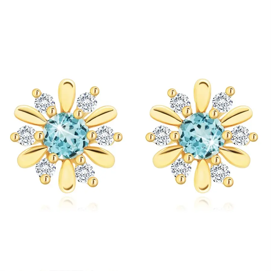 Zlaté náušnice 9K kvet s modrým topásom a čírymi zirkónmi