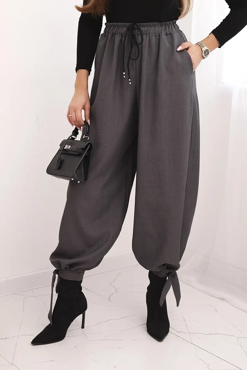 Kesi Włoski Dámske nohavice so širokým strihom a viazaním dole grafitové