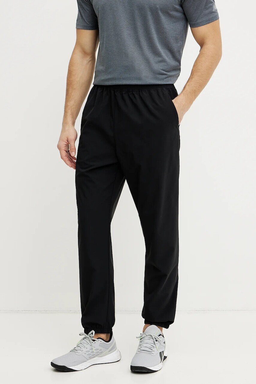 Tréningové nohavice On Focus čierna farba, jednofarebné, 1ME30390553