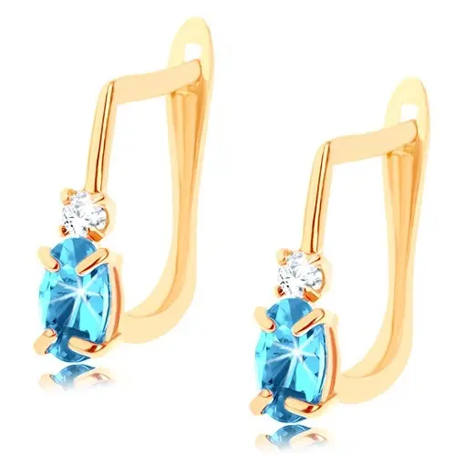 Náušnice v žltom 14K zlate - oválny modrý syntetický topás, číry zirkónik