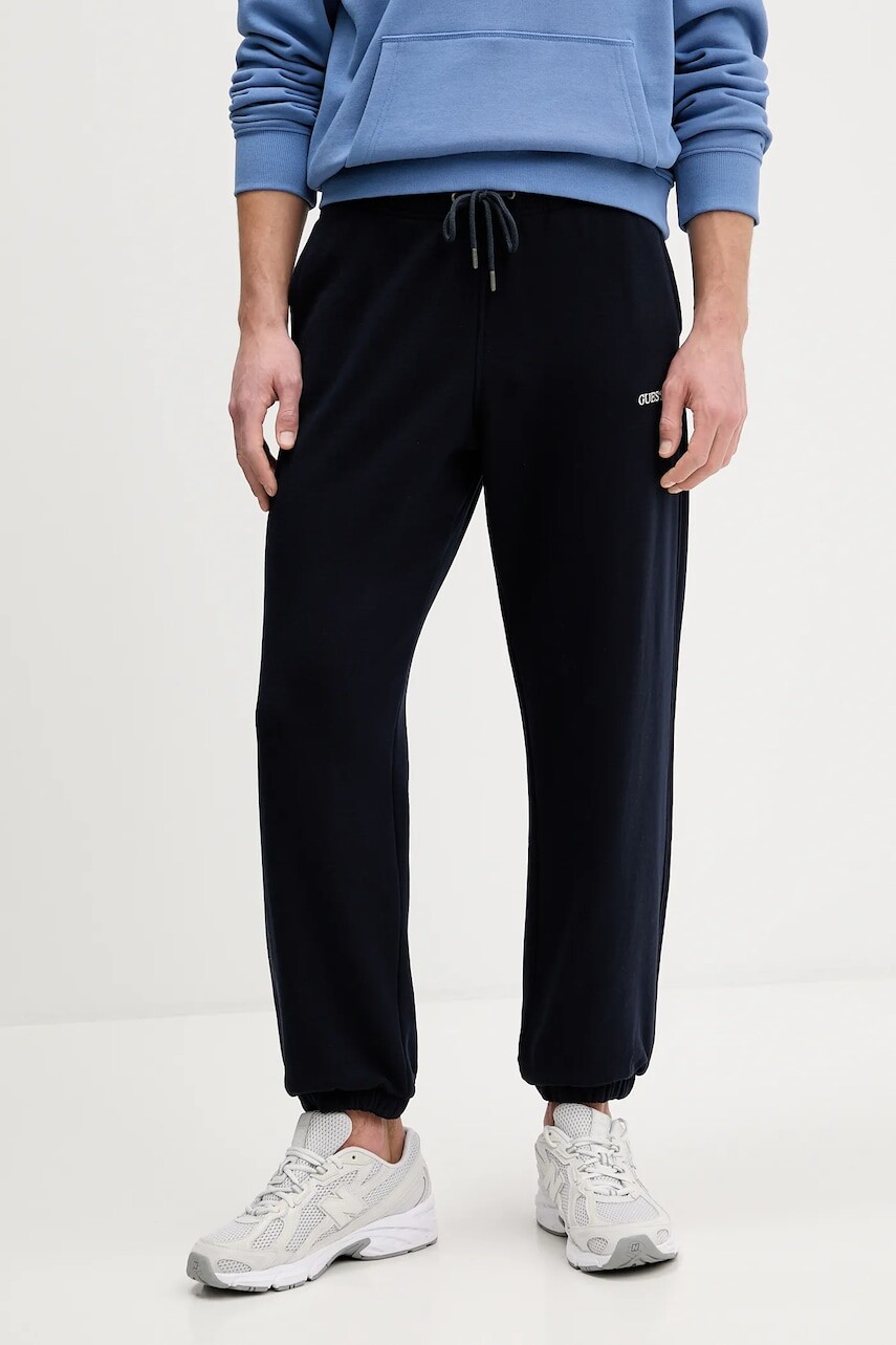 Bavlnené tepláky Guess Jeans tmavomodrá farba, jednofarebné, M6RB70 KCPR1