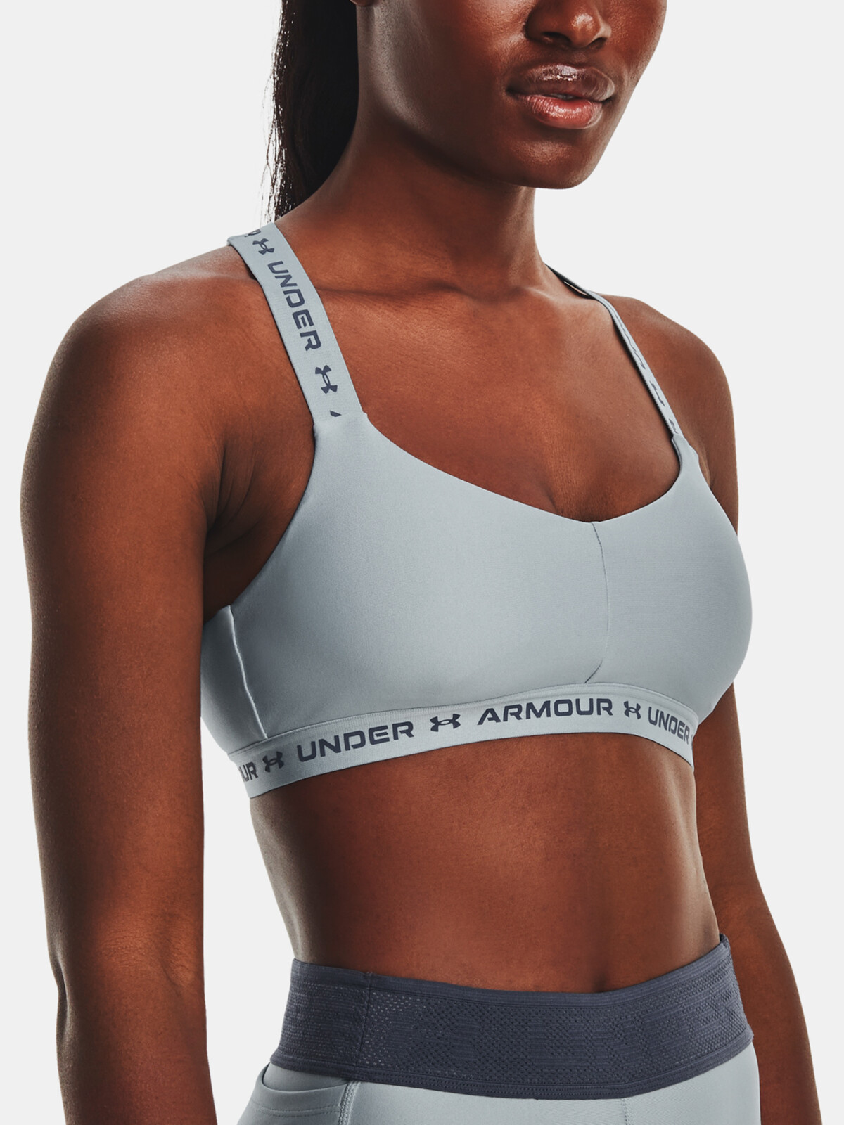 Svetlosivá športová podprsenka Under Armour Crossback Low