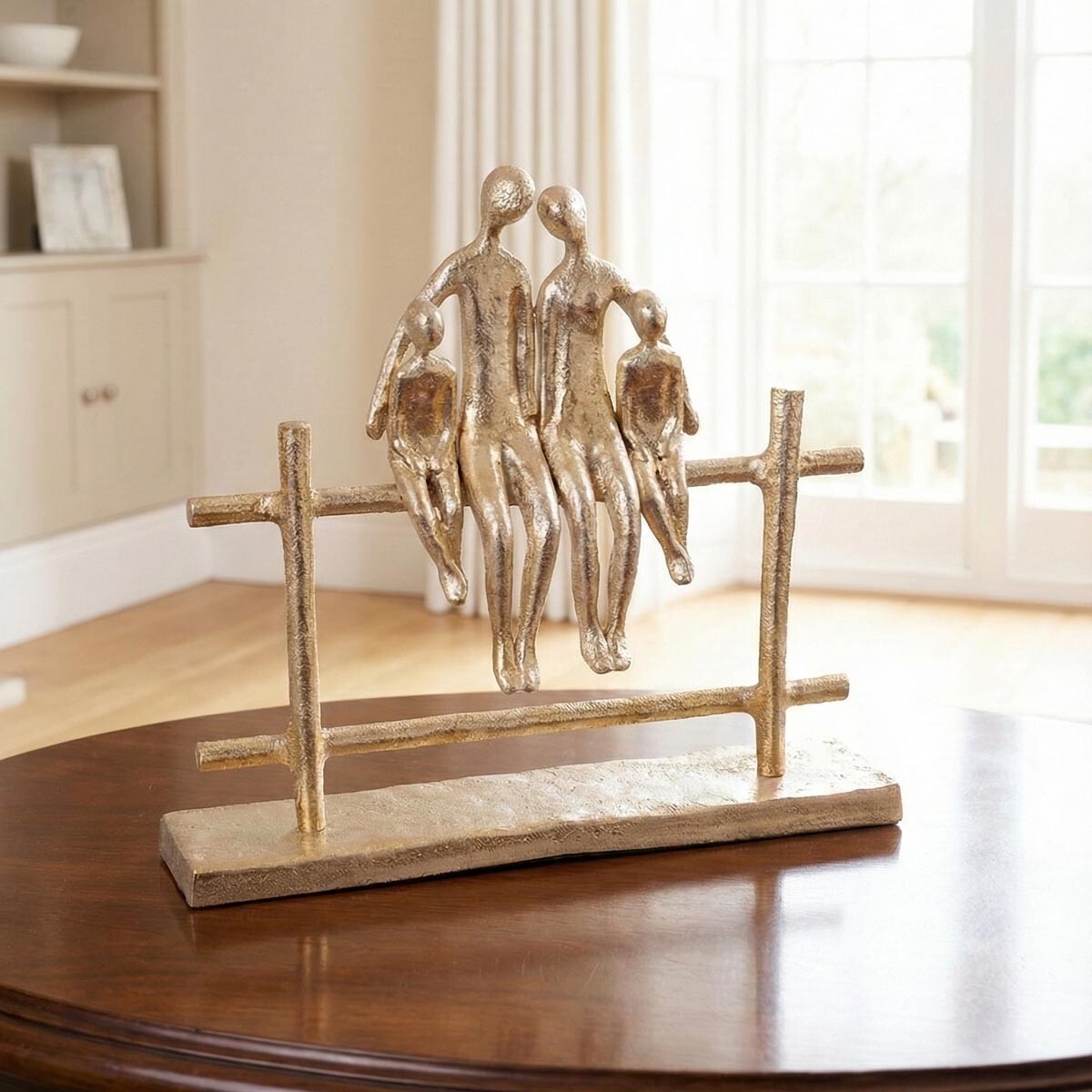 Rodinná socha na zábradlí