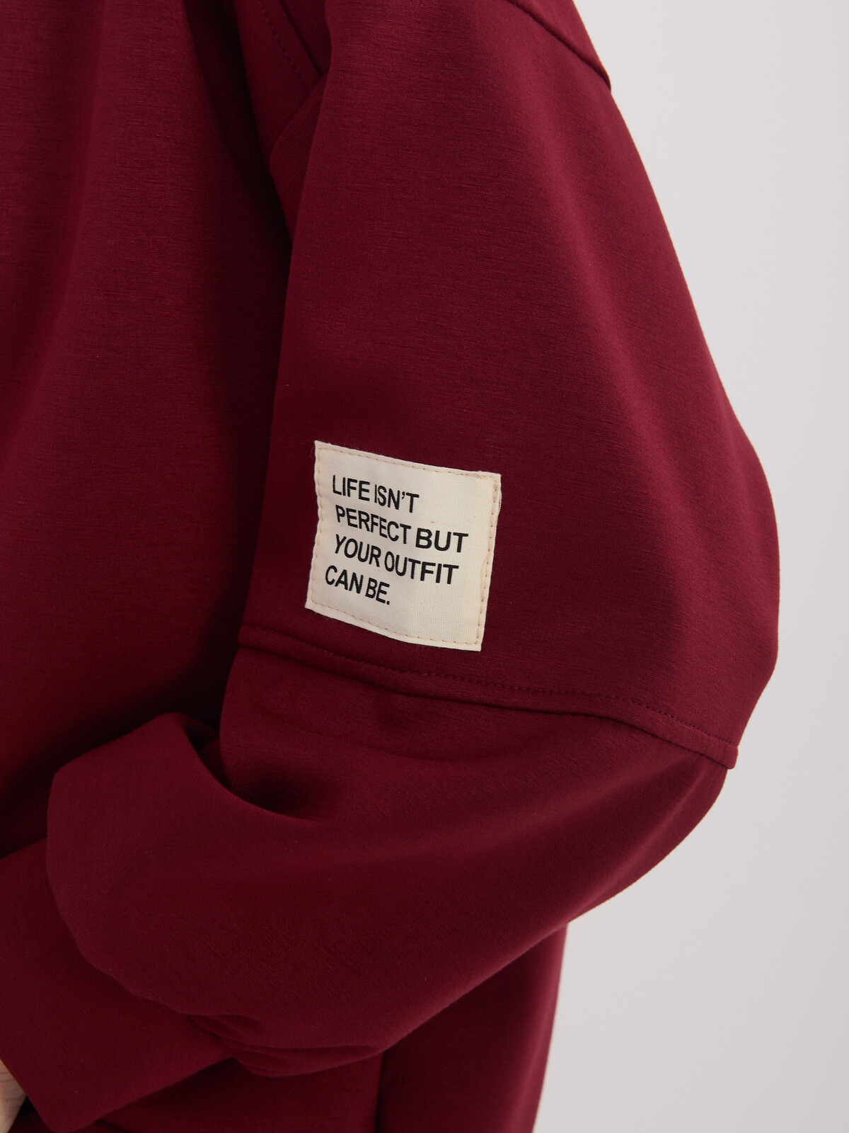 Dámsky teplákový komplet v tmavočervenej farbe