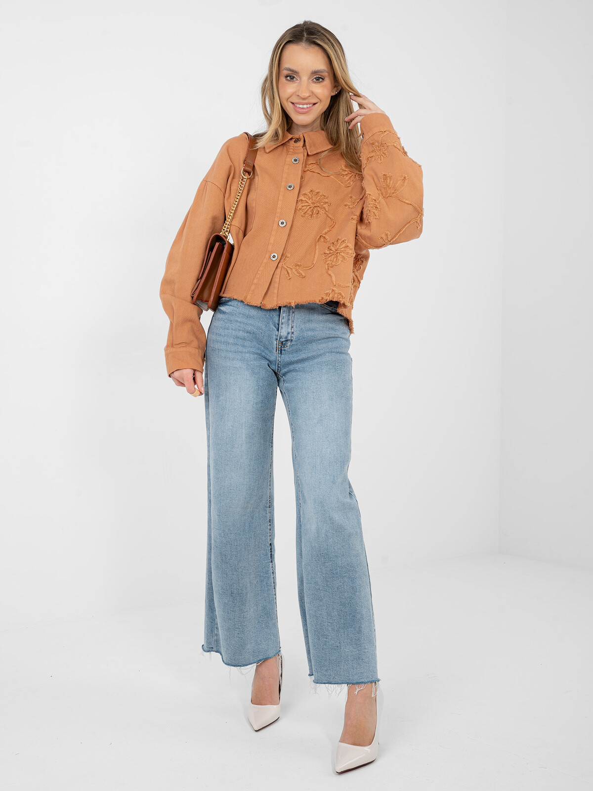 Dámska rifľová bunda v tmavo oranžovej farbe