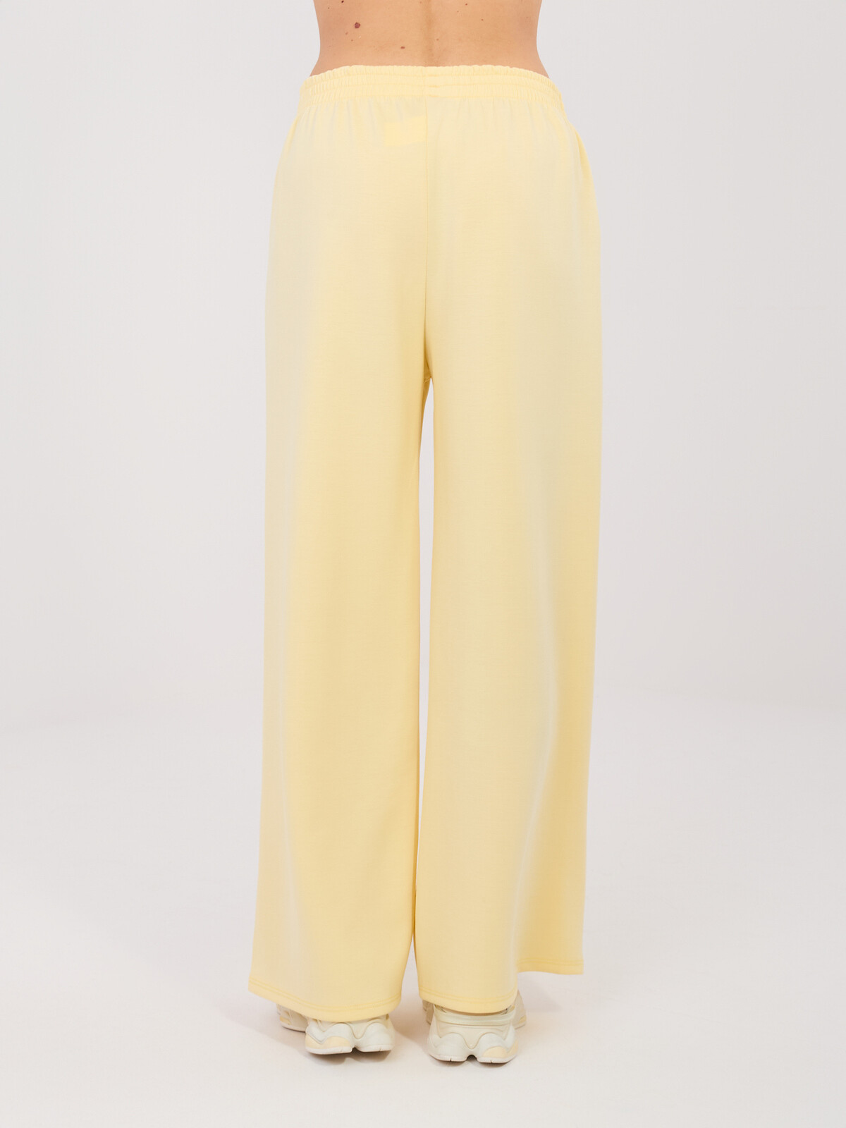 Žlté nohavice s ružovými pruhmi