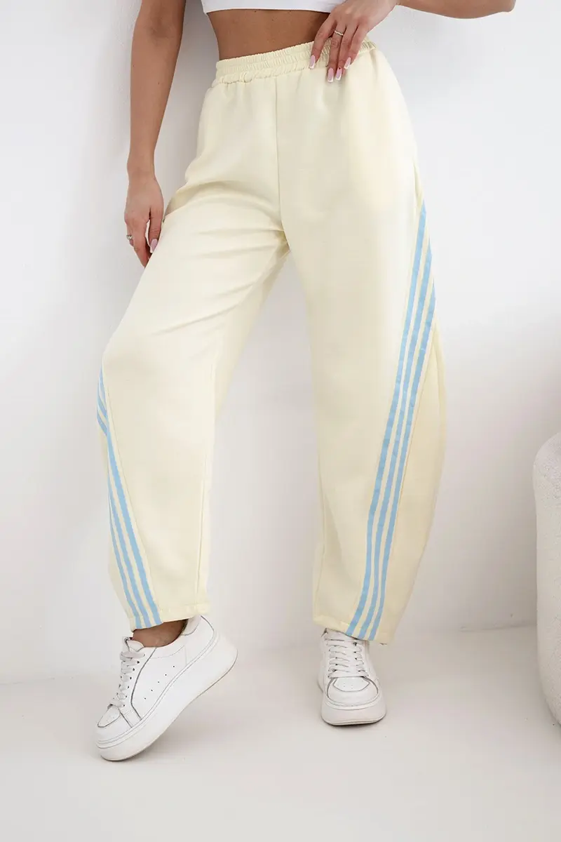 Dámske žlté nohavice s bočnými pásikmi