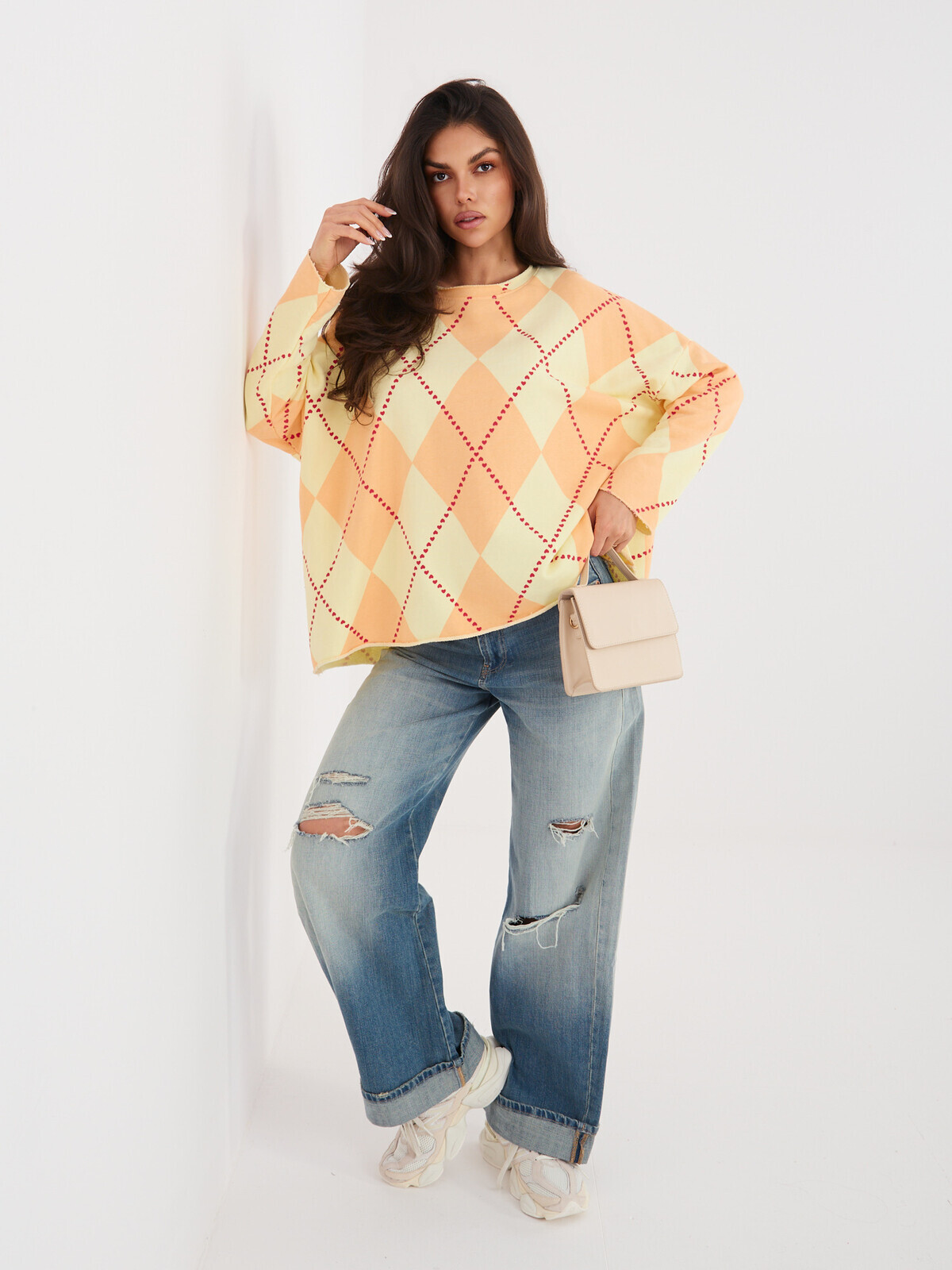 Oranžová mikina v geometrickom vzore