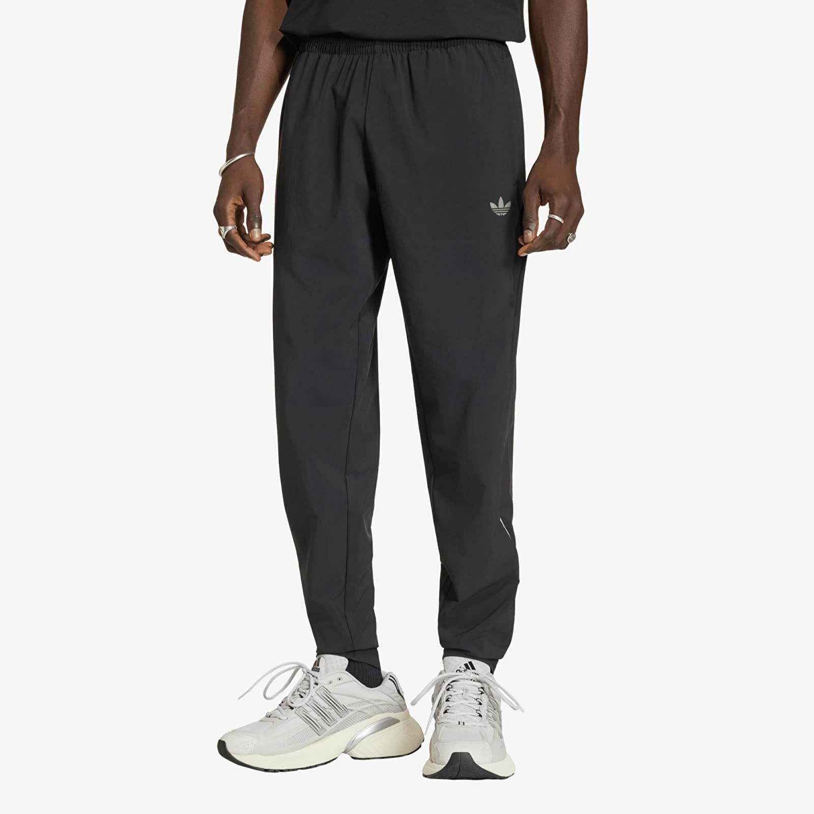 Kalhoty adidas Tech Trefoil Essentials Woven Pant Black S