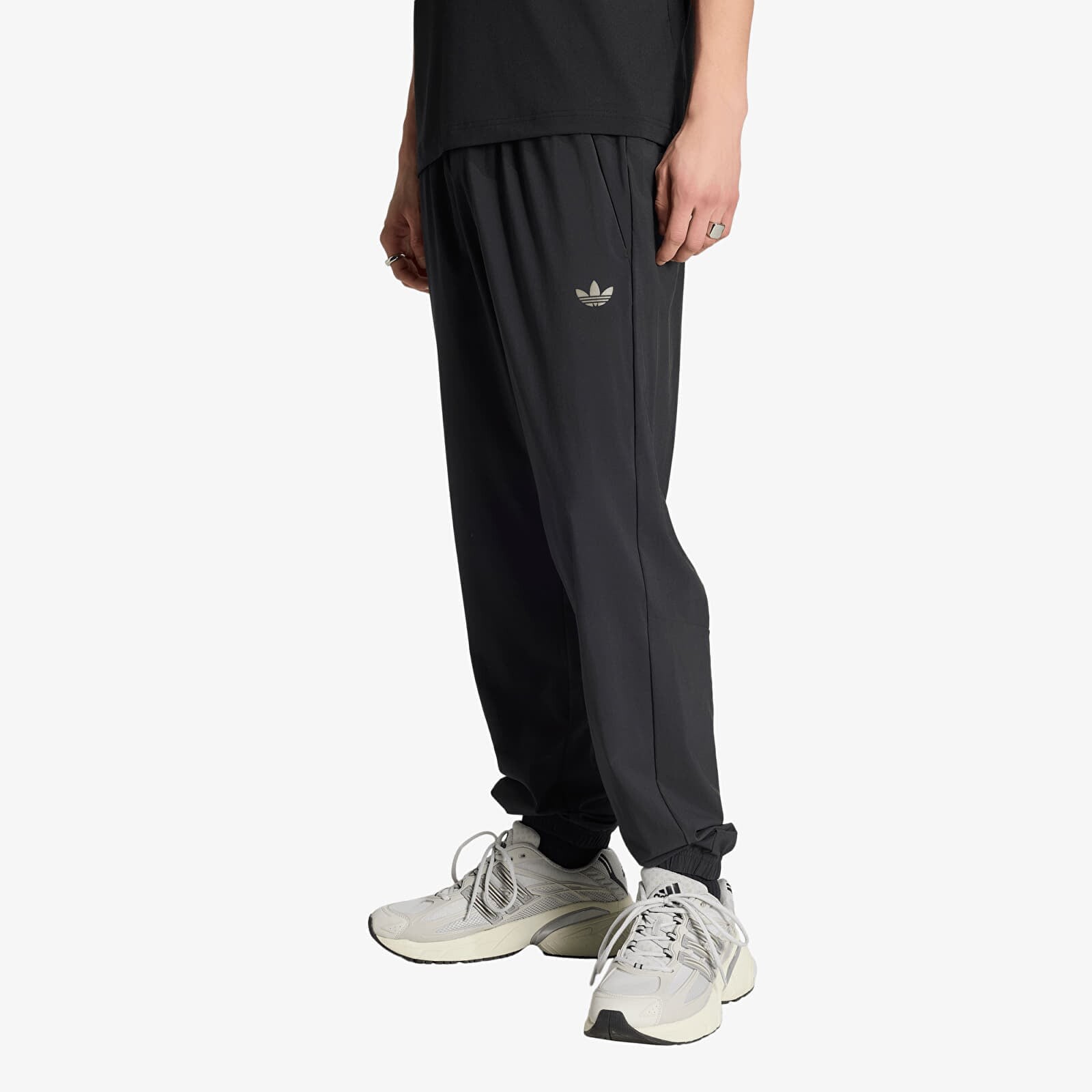 Kalhoty adidas Tech Trefoil Essentials Track Pant Black M