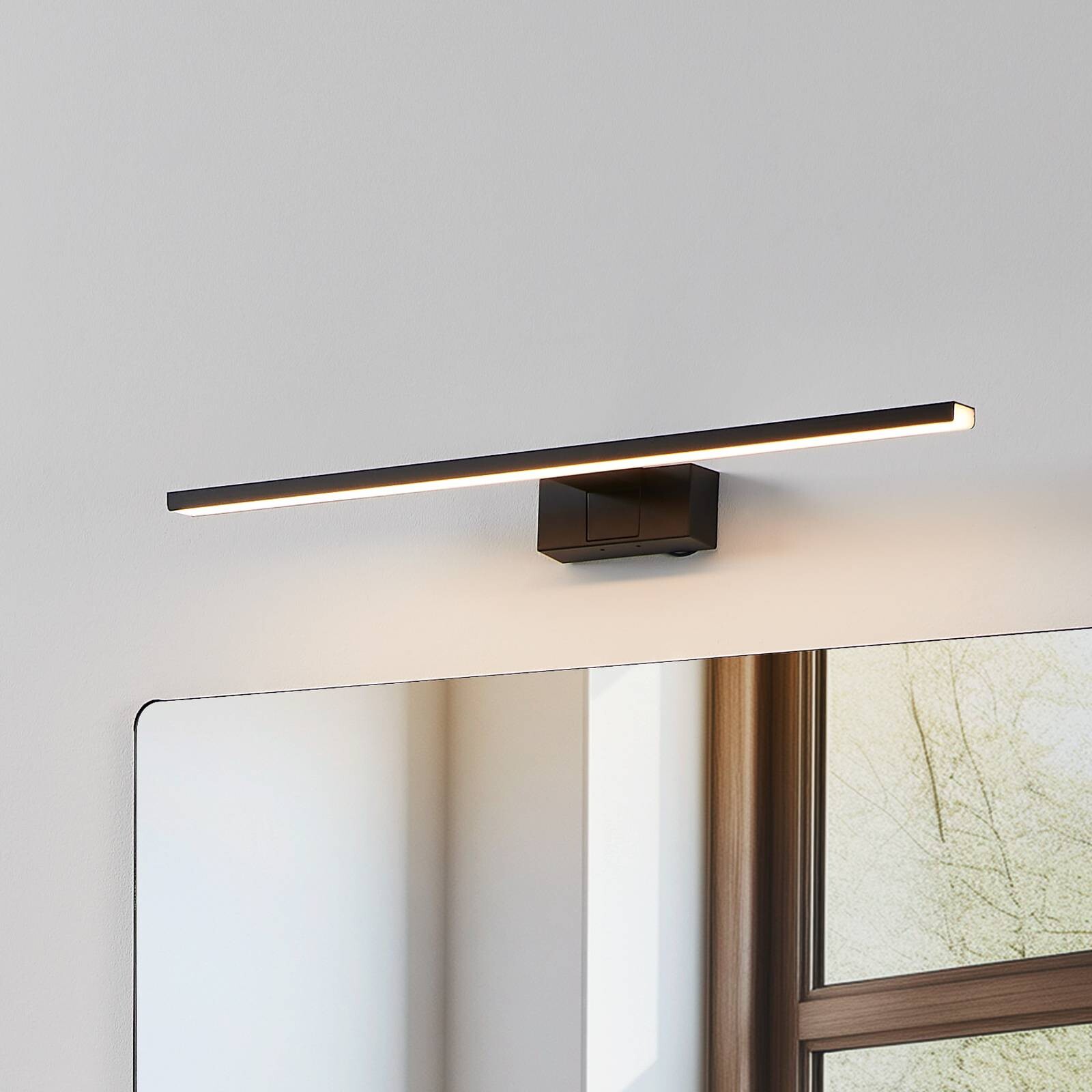 LED nástenné svetlo Conettilla, čierne, šírka 60 cm, IP44, CCT