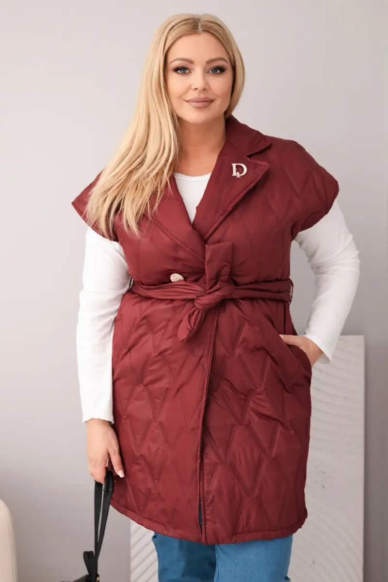 Dámska prešívaná vesta s opaskom a golierom