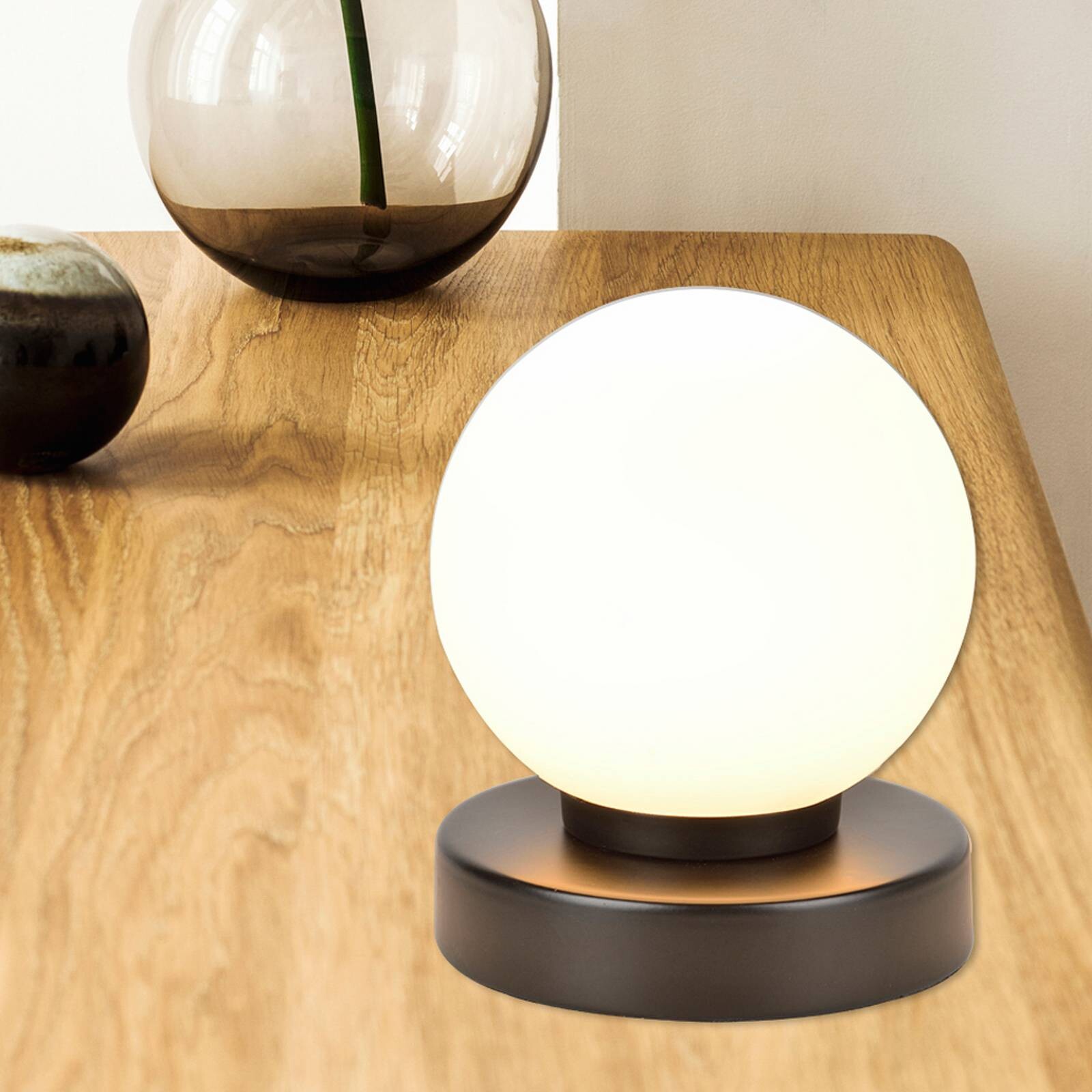 Stolová lampa Seventy, matná čierna, výška 15 cm, kov/sklo