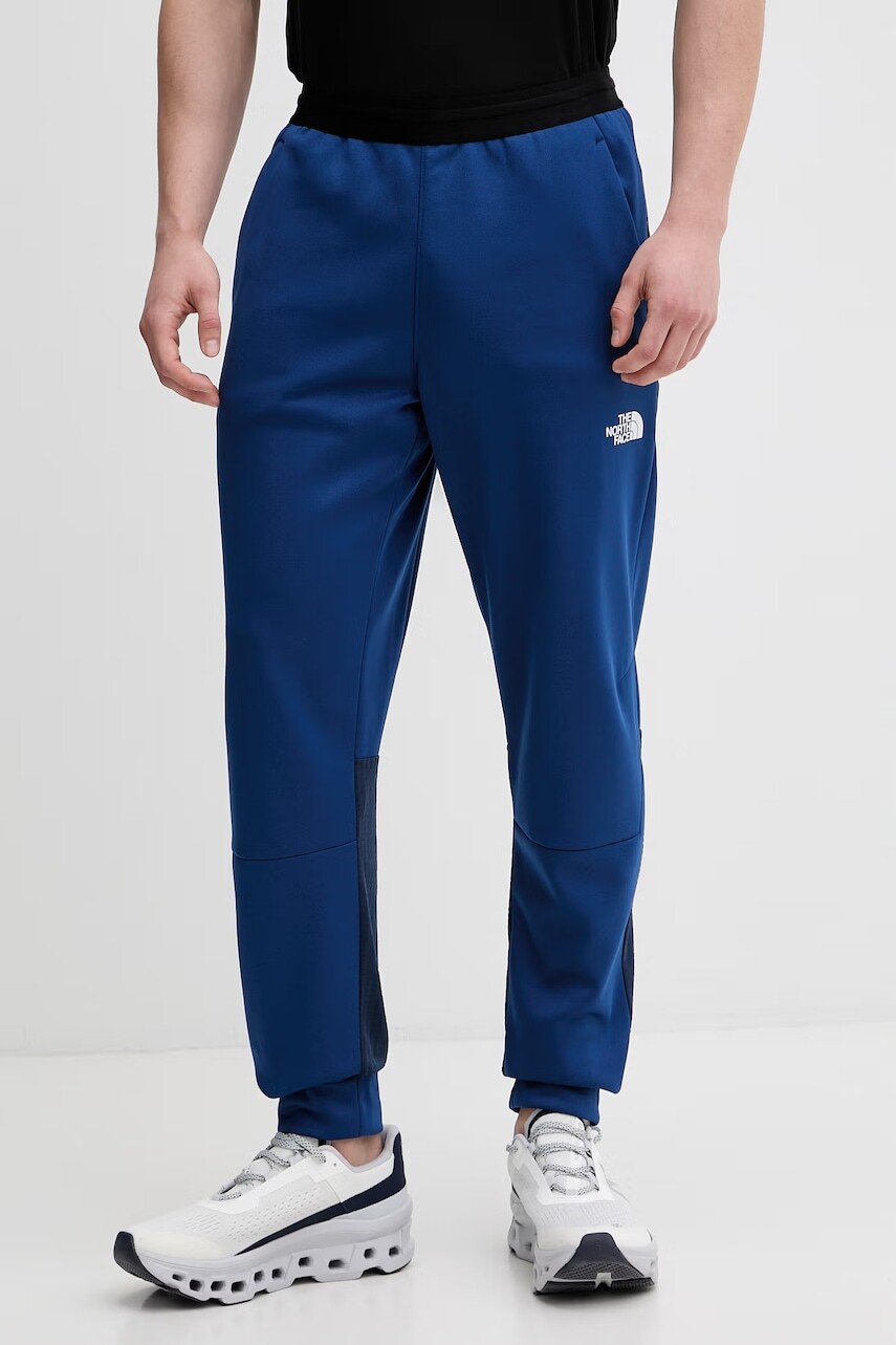 The North Face teplákové nohavice pánske MOUNTAIN ATHLETICS FLEECE