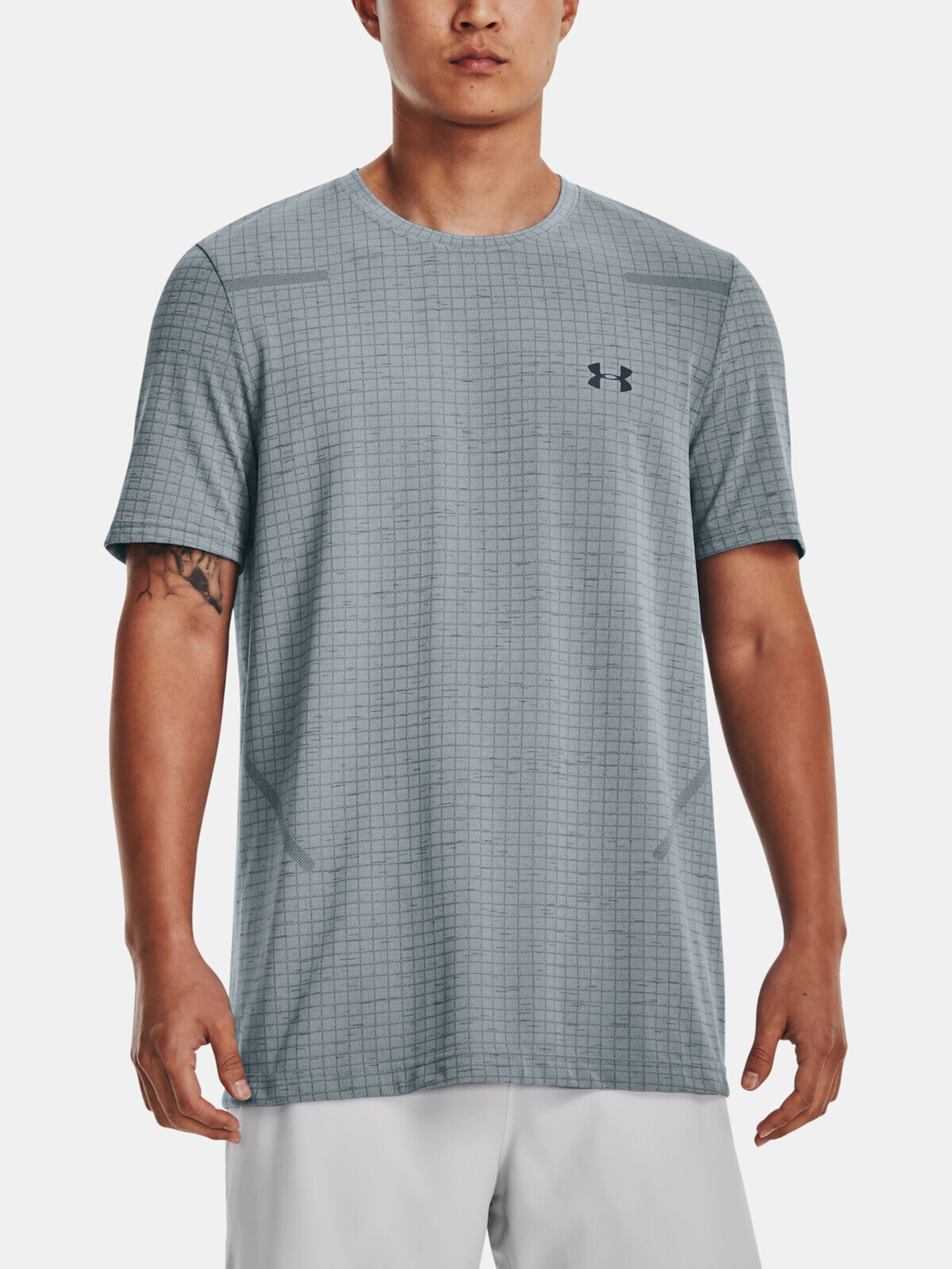 Svetlosivé športové tričko Under Armour UA Seamless Grid SS