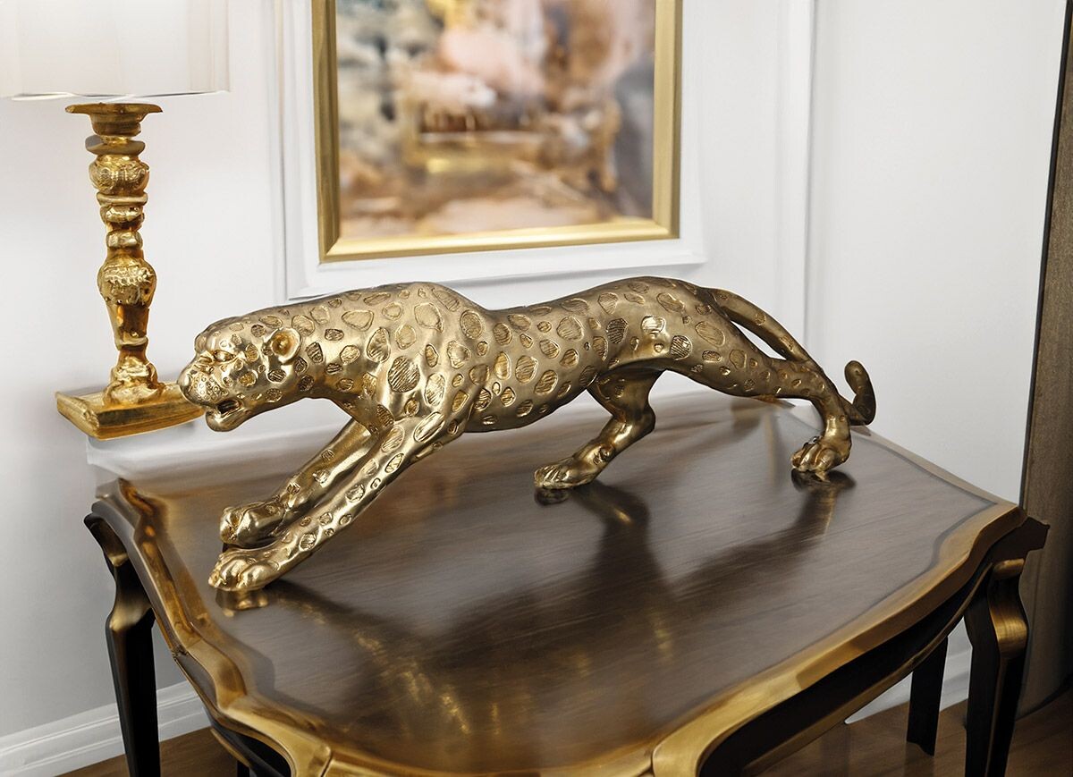 Dekoratívna zlatá soška leoparda