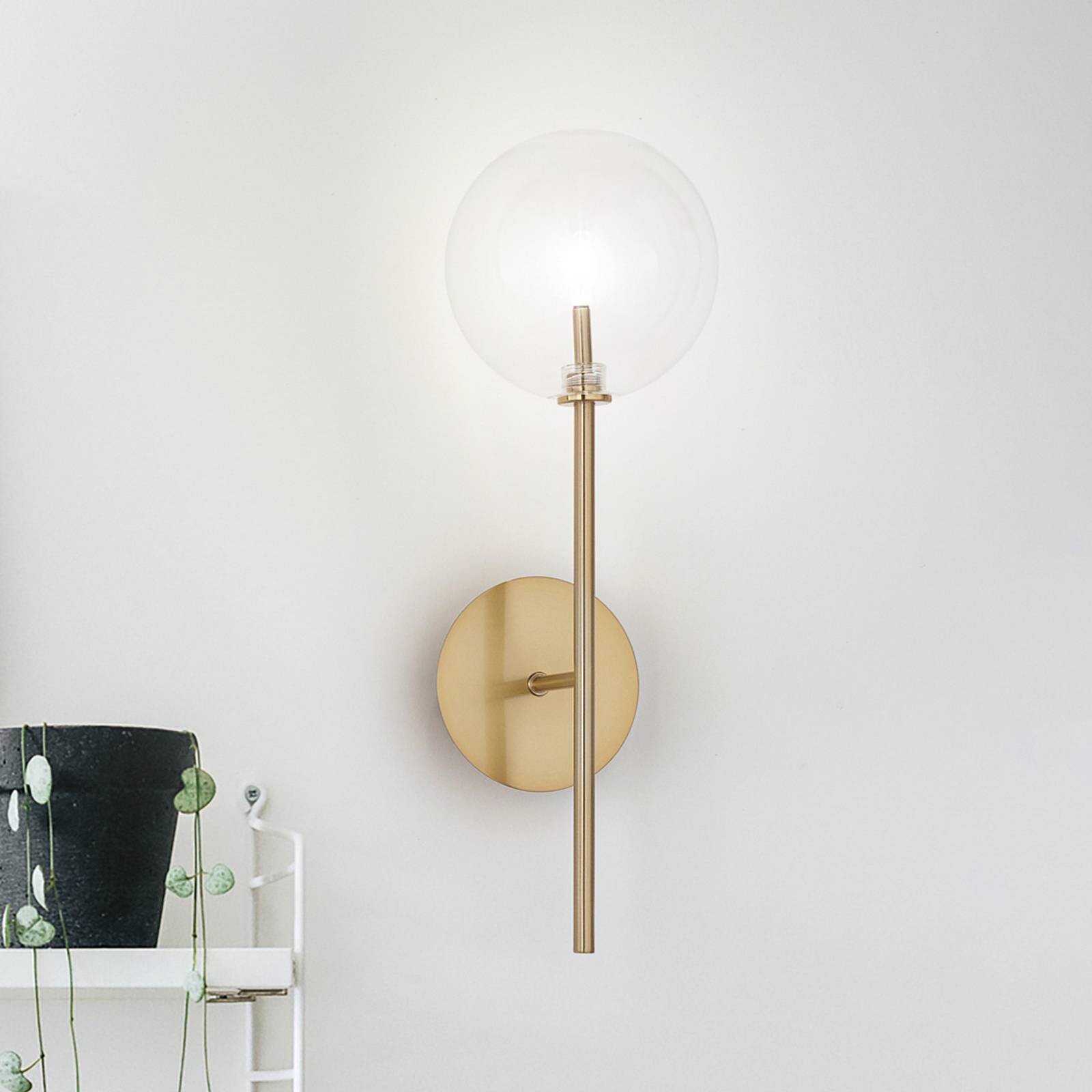 Nástenné svetlo IDEAL LUX Equinoxe, mosadz/jantár, výška 45 cm