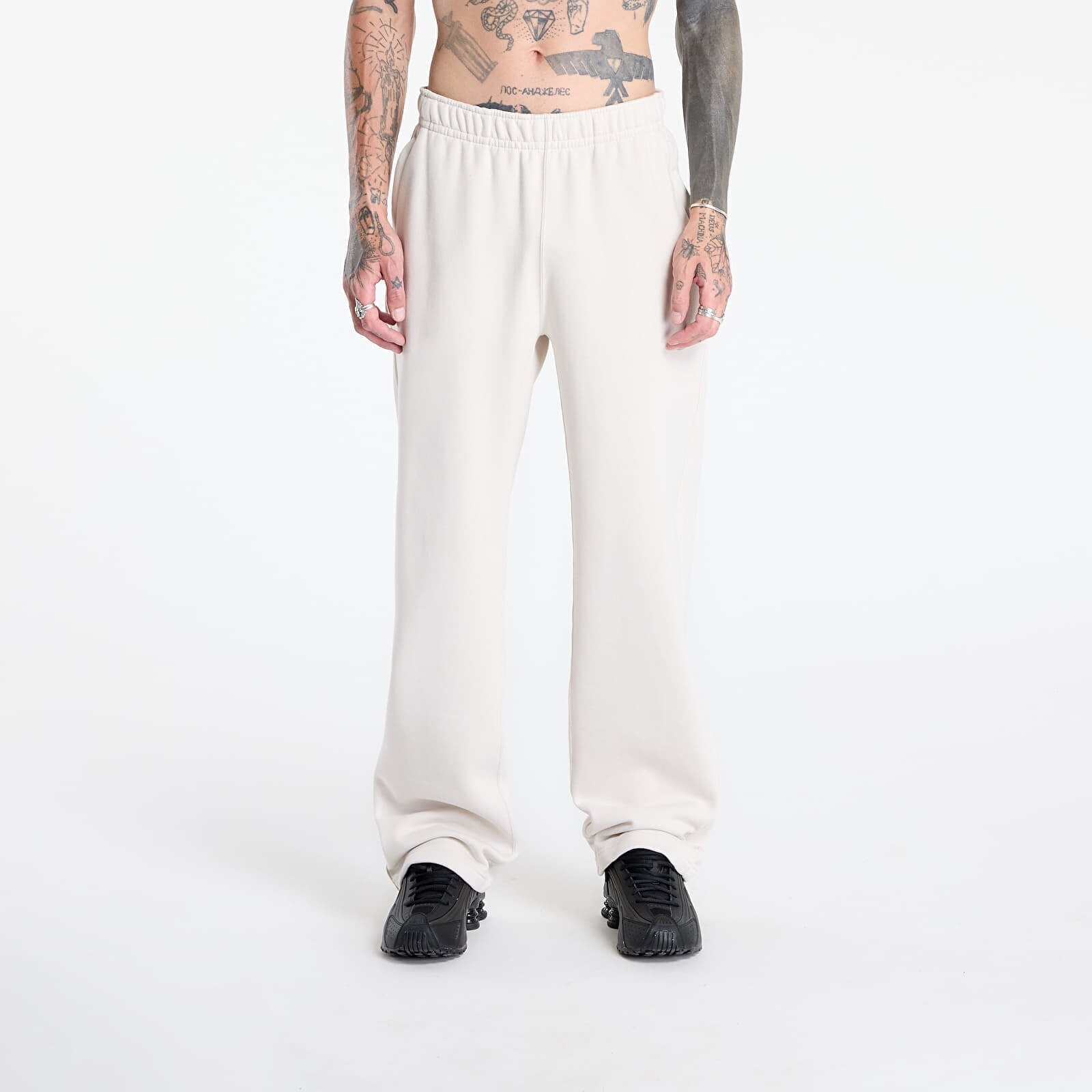 Tepláky Nike x NOCTA Fleece CS Open-Hem Sweatpants Lt Orewood Brn/ Lt Orewood Brn/ Team Red M