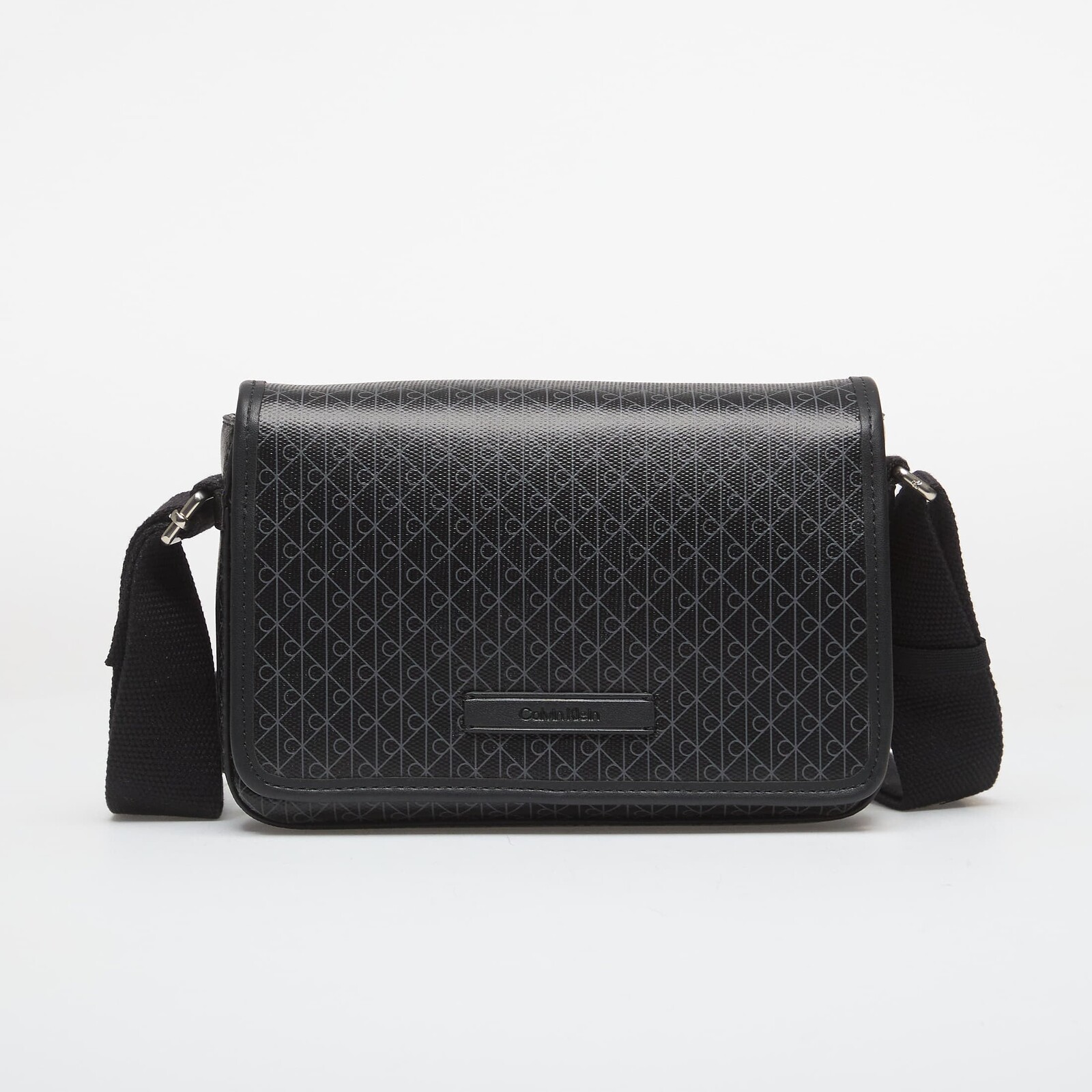 Taška Calvin Klein Emblem Aop Coated Small Flap Mes Black/ Aop Universal