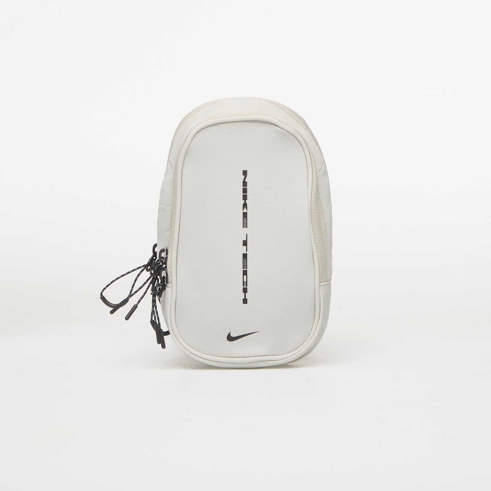 Taška Nike Commute Nike Tech Crossbody Bag 1L Light Bone/ Light Bone/ Black 1 l