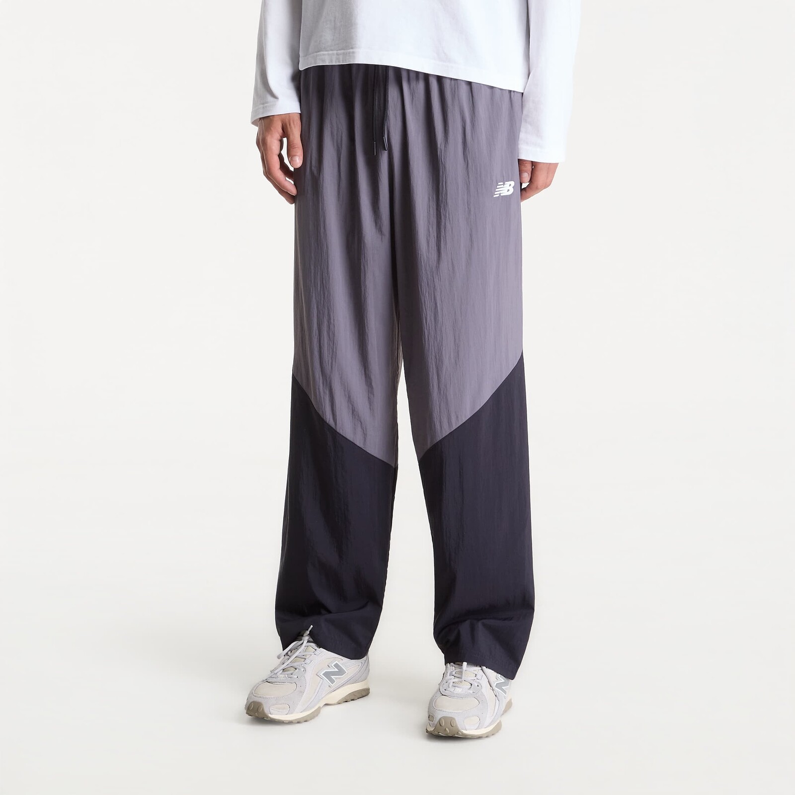 Kalhoty New Balance Sport Legacy Pant Neptune Grey/ Dark Night M
