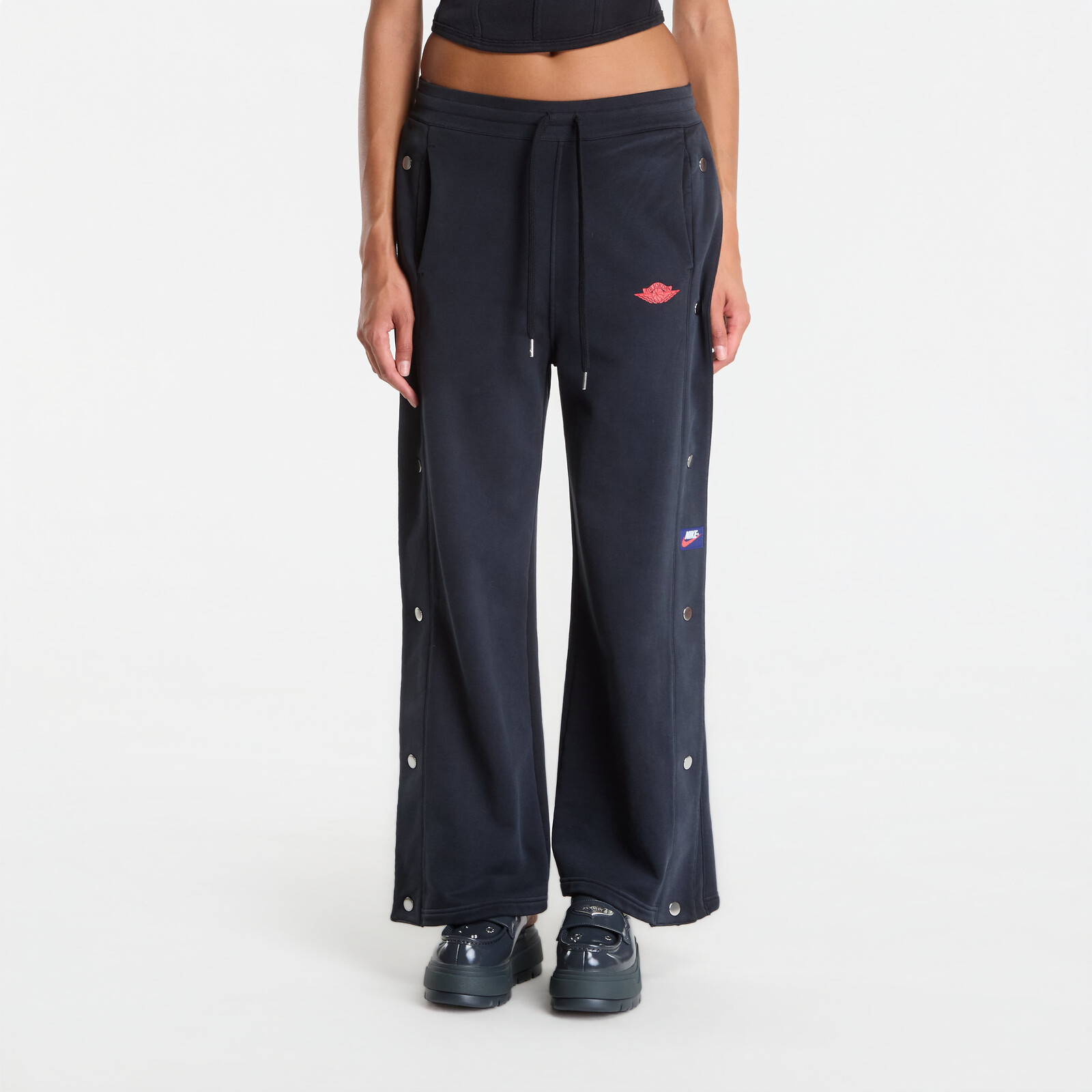 Tepláky Jordan Flight Fleece Women's French Terry Snap Pants Black/ University Red XS