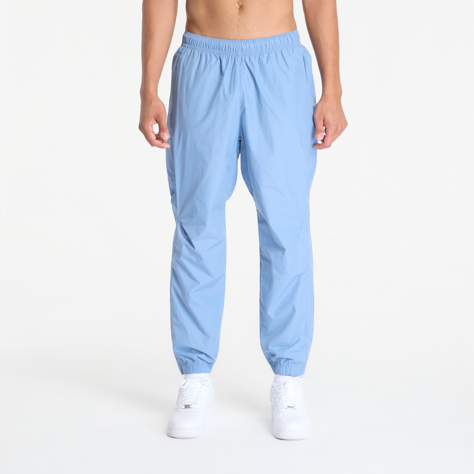 Kalhoty Nike x NOCTA Northstar Nylon Track Pants Work Blue/ Polar XXL