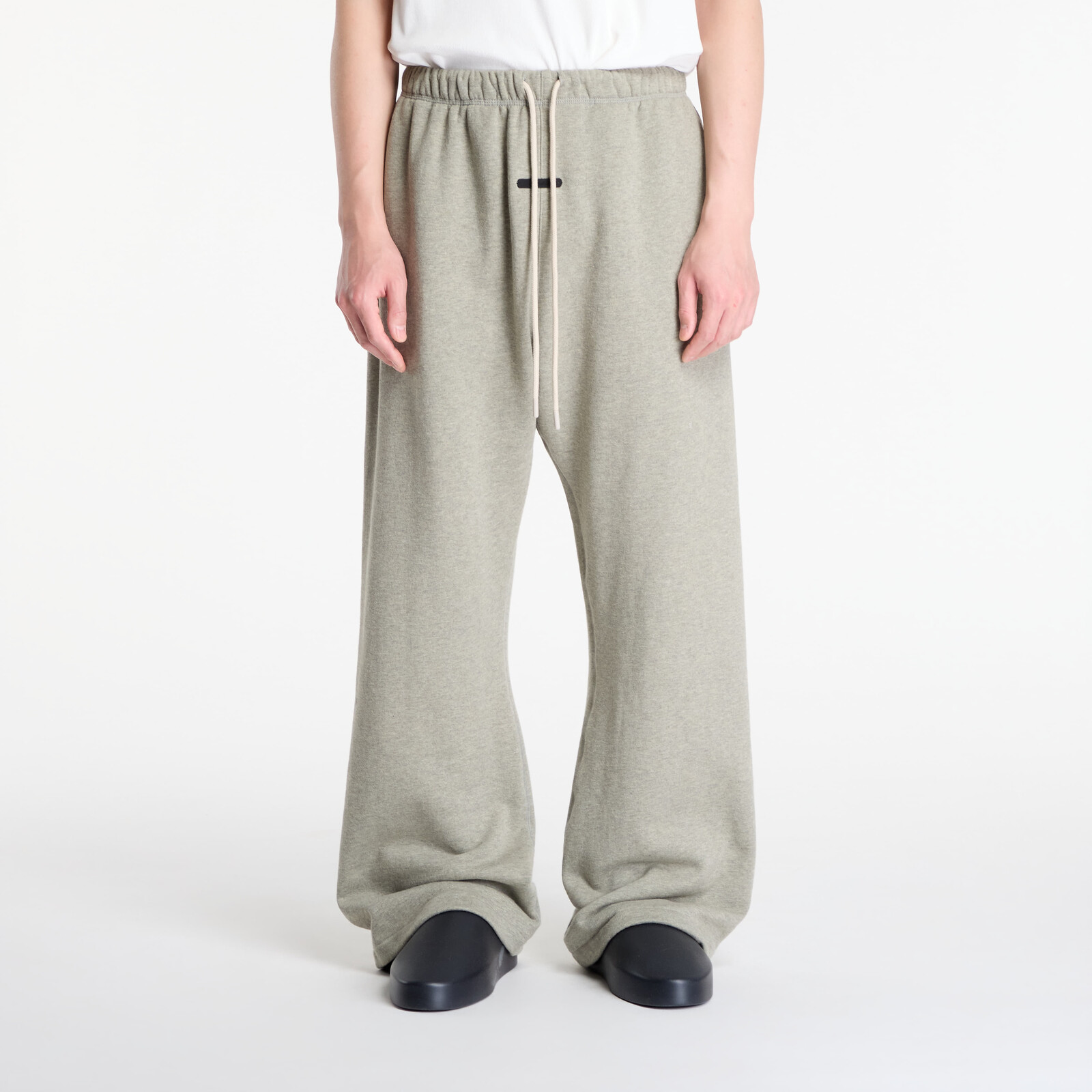 Tepláky Fear Of God Essentials Flare Sweatpant Washed Seal Heather S