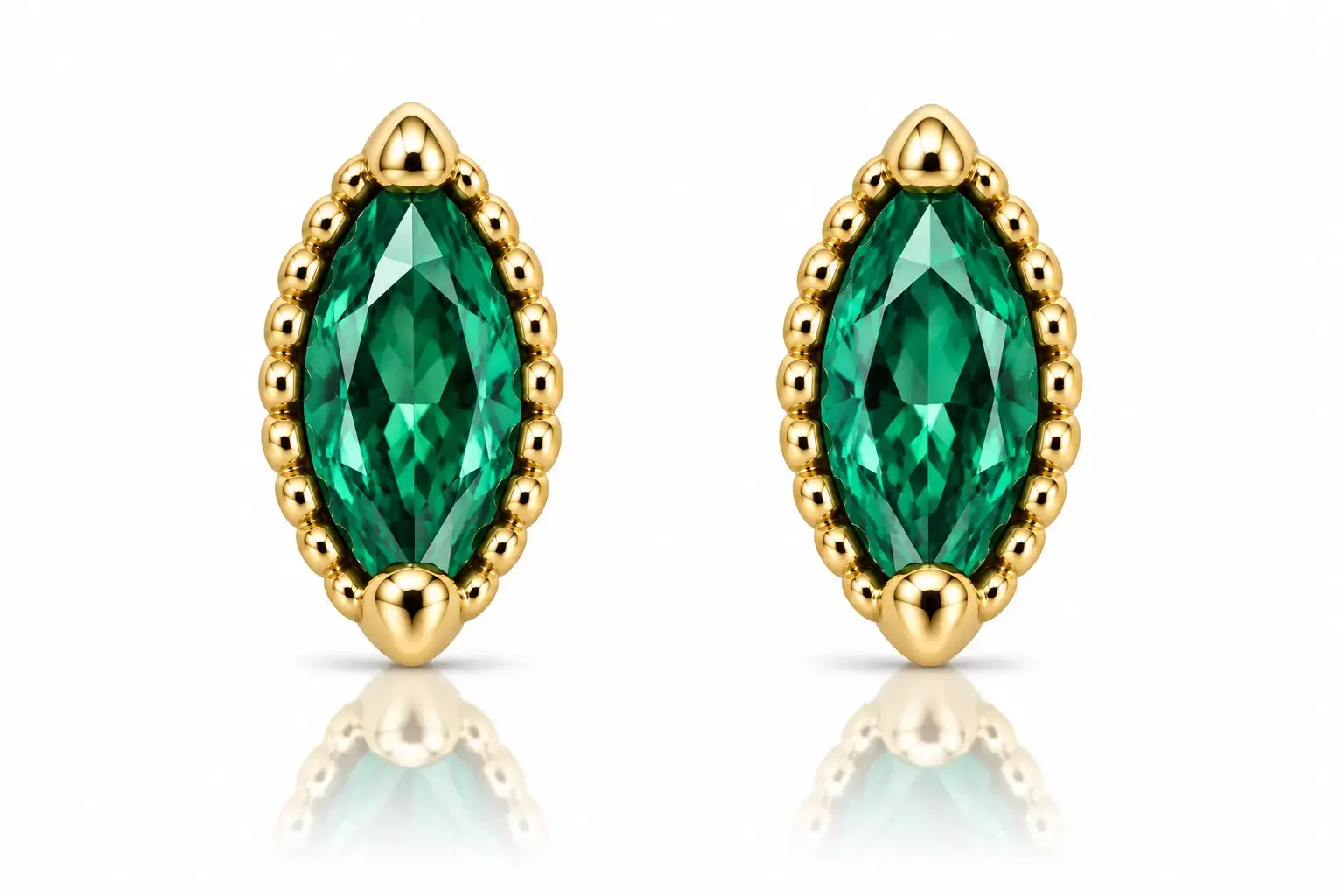 Dámske náušnice zo žltého 9K zlata ovály so smaragdom