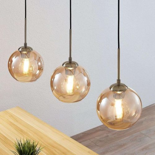 Lindby Sofian závesná lampa, 3-pl., jantár