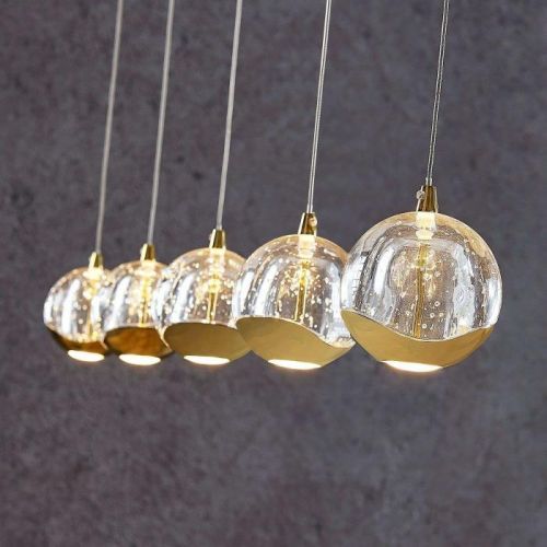 Závesná lampa LED Hayley, 5 svetiel, dlhá, zlatá